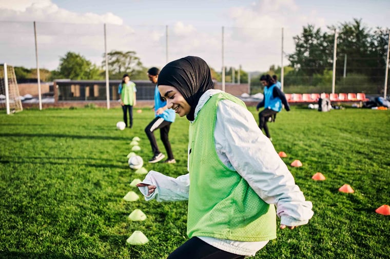 Person training for soccer