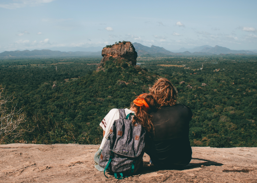 A couple embracing overlooking the view of Sigiriya